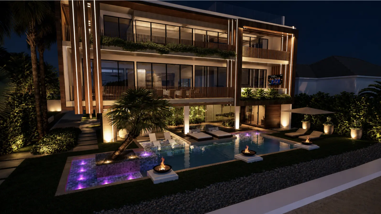 Night view of the residence with pool, fire bowls and landscape lighting